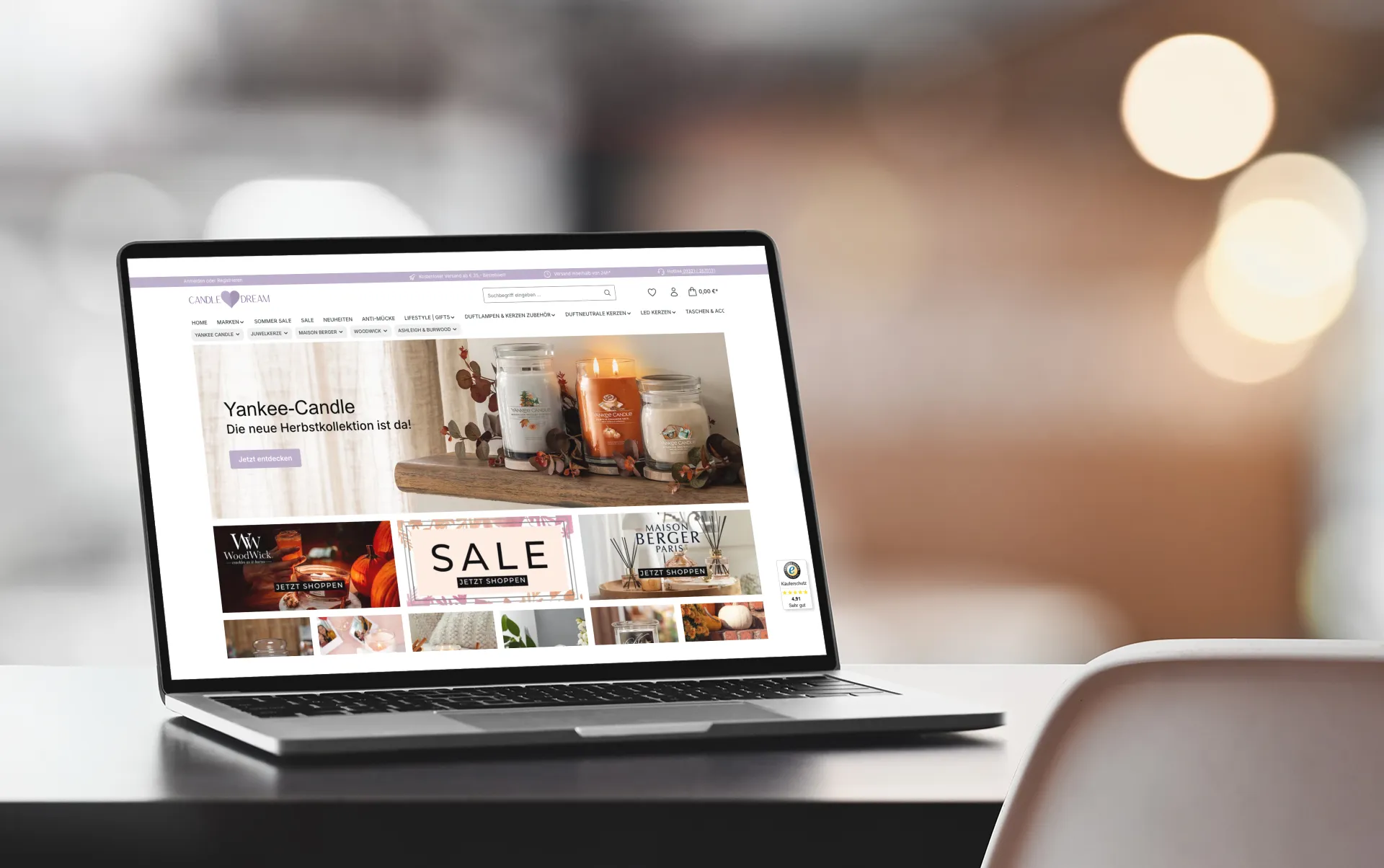 Mockup of a macbook on an office desk m17326 r el2 Candle-Dream – Migration von Shopware 5 auf Shopware 6